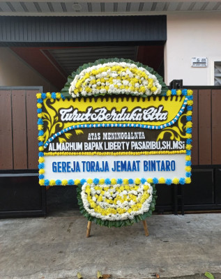 Papan Bunga Duka di Sitinjo